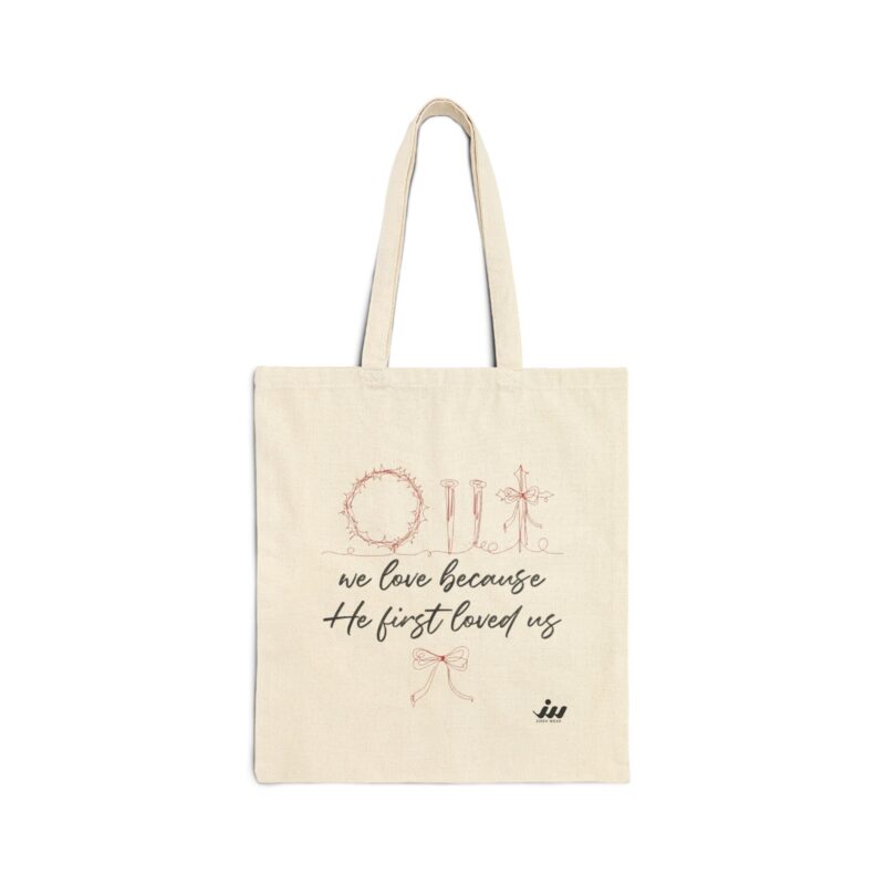 canvas tote bag — "we love because he first loved us" christian cross minimalist grocery shopper